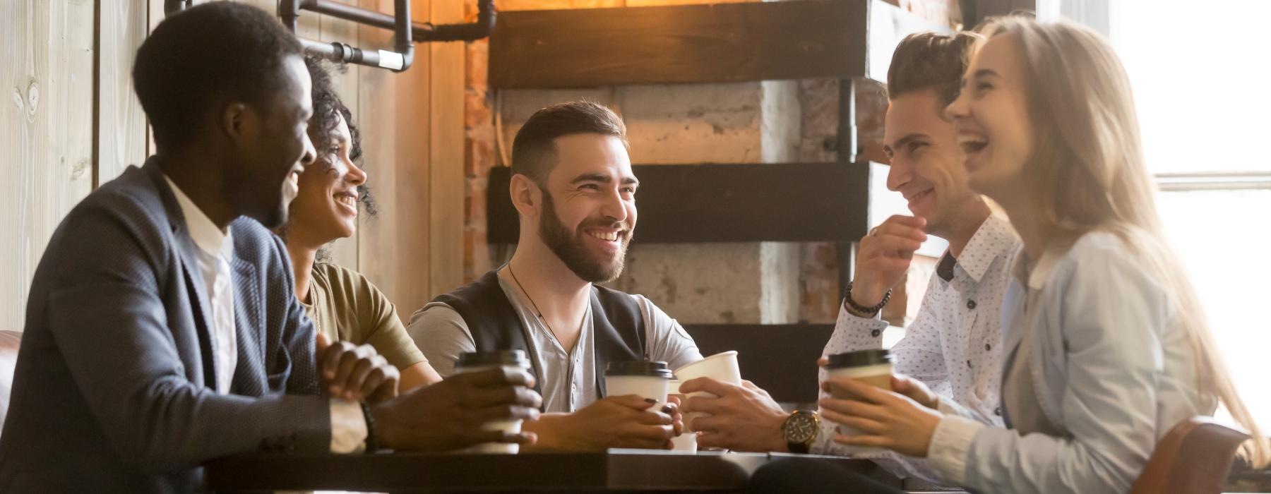 a group of people sitting at a table